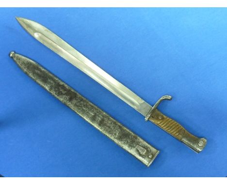 A W.W.1 period "Butcher" bayonet, for Mauser rifle, with 14½-inch blade and steel scabbard, overall 20in (50.75cm) long.