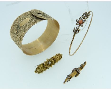 A wide Bangle, in the form of a belt with foliate engraved decoration, 9ct gold back and front, together with a fine yellow m