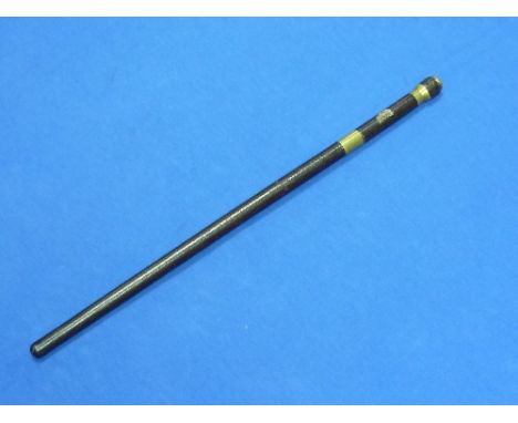 Royal Lincolnshire Regiment, a leather bound swagger stick / sword stick, with brass mounts, bearing Lincolnshire Regiment ba