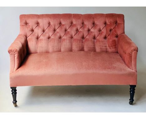 SOFA, Victorian salmon velvet upholstered with button back and ebonised supports, 132cm W. 