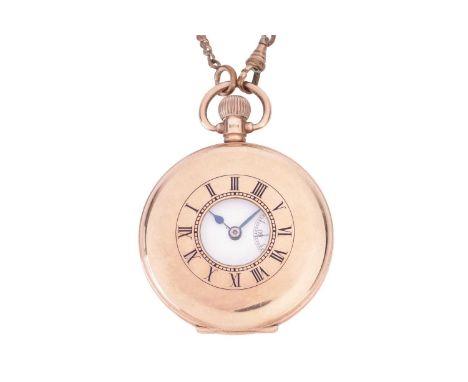 A 9ct gold half-hunter pocket watch, by Dennison Watch Co LTD. Cream dial with Black Roman numerals on both the outside case 