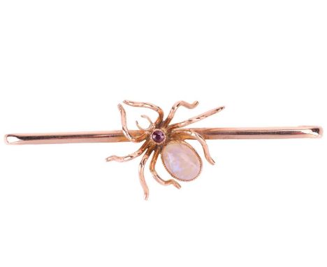 A gem set spider bar brooch, the body of the spider featuring a bezel set opal and ruby with millegrain detail, to a rose met