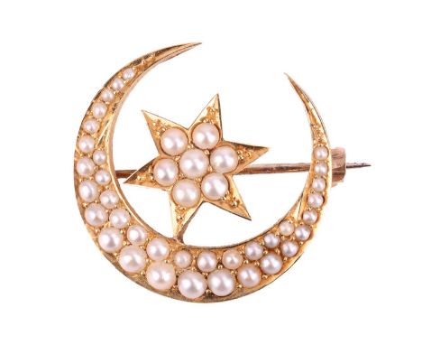 An Edwardian split pearl crescent brooch, comprising two rows of graduated split pearls in the crescent mount, encompassing a
