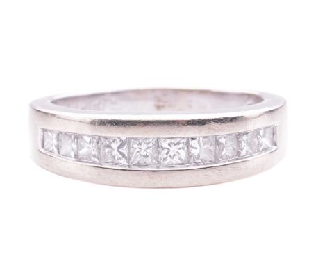 A princess-cut diamond half-hoop ring, channel-set with ten graduated princess-cut diamonds, with an estimated total weight o