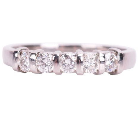 A diamond five-stone ring in platinum, comprising five brilliant-cut diamonds in a bar setting, with an estimated total weigh