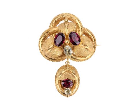 A Mid-Victorian garnet and chrysoberyl love knot brooch, circa 1850s, in form of three interlocking rings with applied cable 