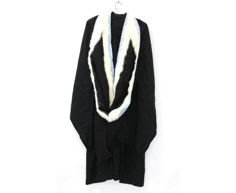 Collection of Academic dress items comprising 3 Vintage Mortar boards,  an Academic Gown, Cambridge fur edged Hood edged in b