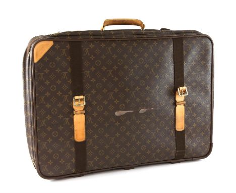 Louis Vuitton Satellite 70. Suitcase. France. 2000s. 70,0 x 50,0 x 15,0 cm. Monogram canvas with calf leather, cotton fabric 