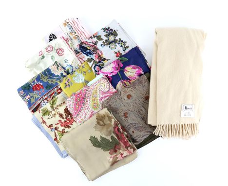 A quantity of silk scarves and a large cream cashmere shawl, in items by Liberty, Ralph Lauren and Harrods (10)Condition Repo