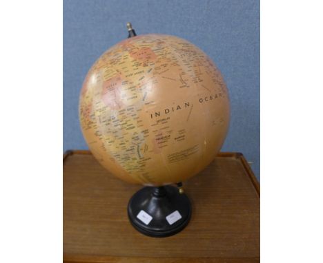 A terrestrial globe and a map