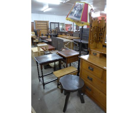 An oak barleytwist side table, oak gateleg occasional table, carved stool, a mahogany standard lamp and an oak side table