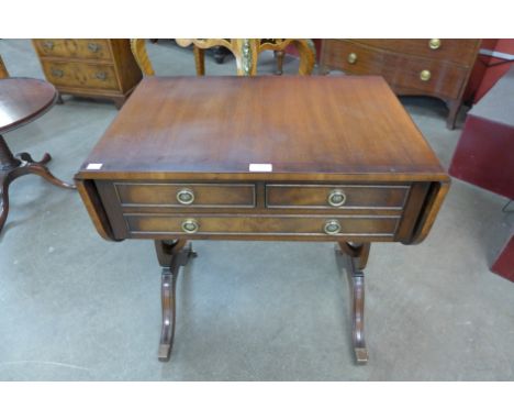 A small Regency style mahogany sofa table