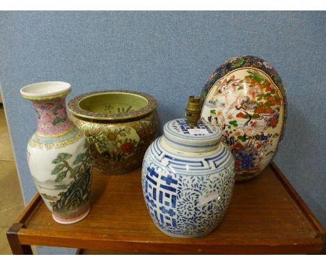 A Chinese hand painted fish bowl, ginger jar converted to a table lamp, egg shaped centrepiece and a Chinese vase