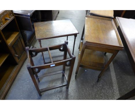 An oak occasional table, trolley and an Arts and Crafts oak stick stand