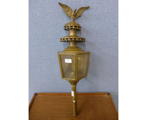 A brass carriage lamp