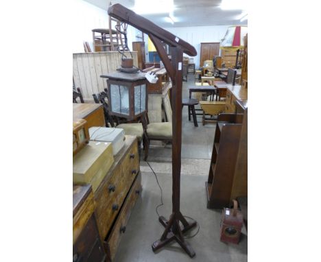 A wooden lantern style standard lamp
