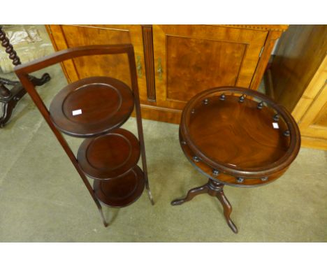 A mahogany tripod wine table and a cake stand