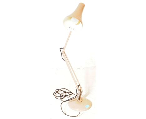 A mid 20th century industrial anglepoise factory desk / table lamp. Of metal construction with conical shade, spring loaded a