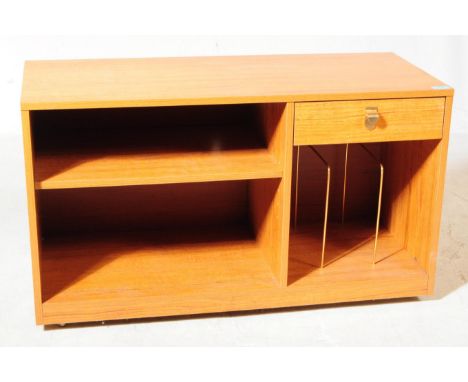 A mid 20th century teak veneer record / entertainment cabinet. The cabinet of rectangular form, featuring a drawer situated a