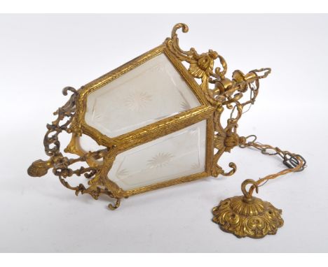 An early 20th century French Empire manner brass and etched glass hanging porch lamp / lantern. The lamp featuring five etche