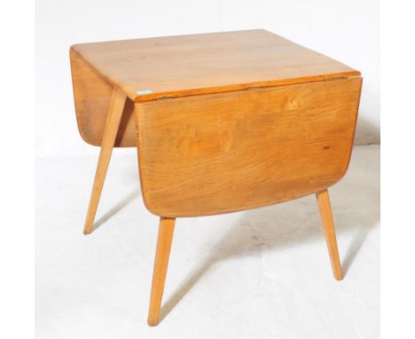 Ercol - Model 383 - A mid 20th century Ercol Model 383 elm drop leaf dining table. The table raised on tapered squared suppor