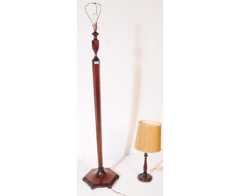 An early 20th century Art Deco oak wood floor standing standard lamp. The lamp having a hexagonal central column, raised abov