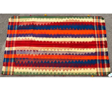 A 20th century South West Persian Jajim Kilim carpet floor rug. The rug having a flat weave with striped banded design in sha