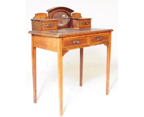 A&nbsp; late 19th century inlaid mahogany bonheur du jour ladies writing desk. The desk having crested oval mirror to back fl