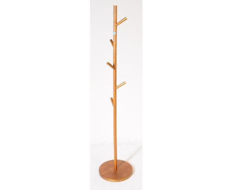 A contemporary Danish Modern Design manner acacia wood floor standing coat rack / stand. The stand supported on a round base,