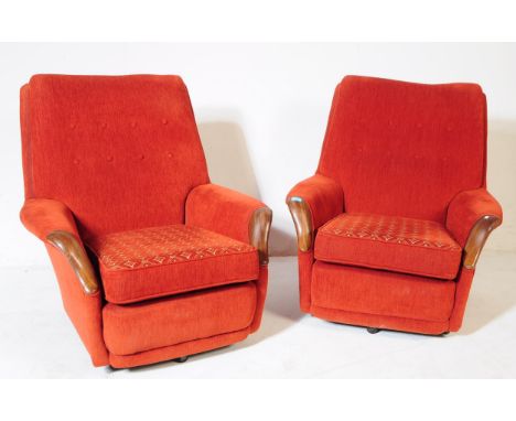 G-Plan - A pair of mid 20th century G-Plan lounge armchairs. The chairs each upholstered in red boucle fabric, with button ba
