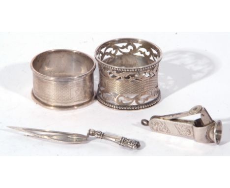 Mixed Lot comprising a silver mounted page marker formed as a trowel, a cigar cutter, and two silver napkin rings, various da