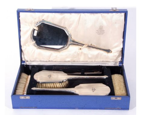 Royal Air Force interest: a George VI silver mounted six piece dressing table set comprising four brushes, a hand mirror and 