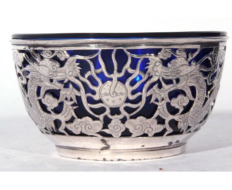 Modern Chinese 20th century white metal mounted sugar basin decorated with pierced detail of dragons chasing a pearl, inset w