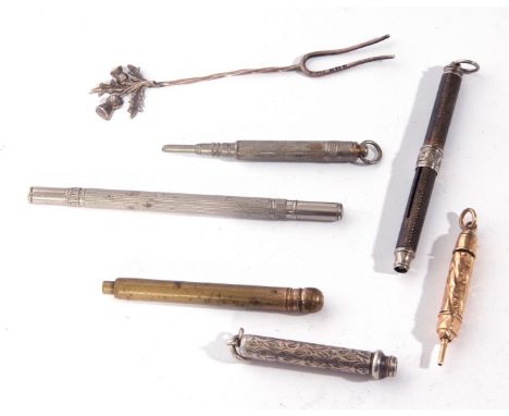 Collection of various propelling pencils to include a yellow metal example, together with a small silver mounted fork with th