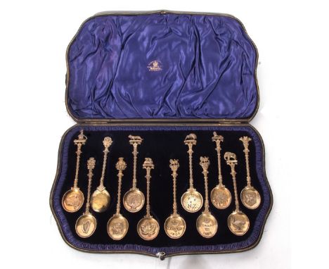 Unusual set of 12 Edward VII silver gilt commemorative spoons produced for the Coronation of Edward in 1902, the spoons decor