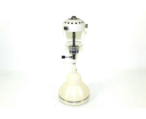 A Bialladin Table Lamp with cream base and top  