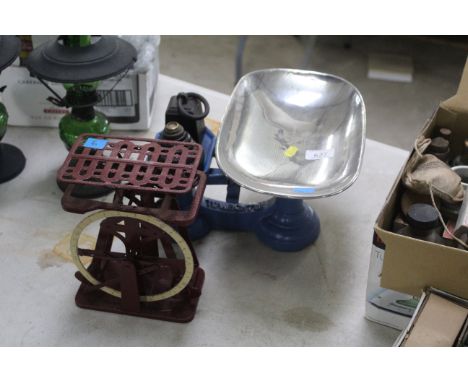 A set of unusual balance scales and a set of kitchen scales with weights 
