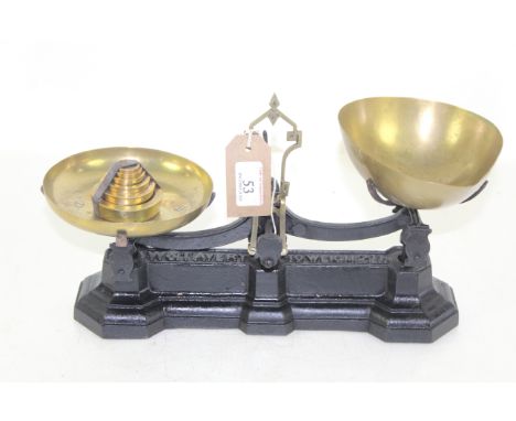 A W.T. Avery set of balance scales to weight 2lbs with brass pans and set of brass weights 