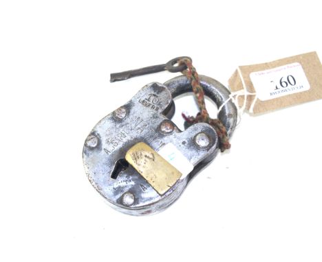 A small vintage padlock with key