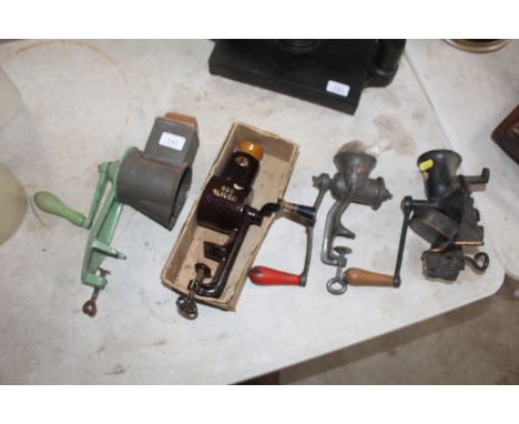 A large grater, bean slicer, mincer and a coffee grinder