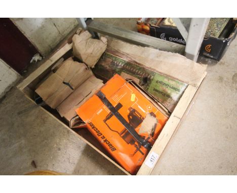 A box containing Black & decker drill attachments, jig saw cutter, edge cutter, sander etc.