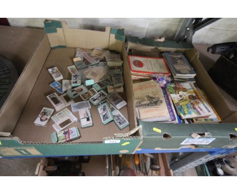Two boxes containing a large quantity of cigarette cards, cigarette card albums, vintage Ordnance Survey maps etc.