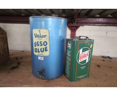 A Valor Esso Blue paraffin drum with brass tap and a Castrol Classic XXL 40 oil can