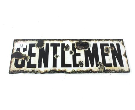 A double sided enamel sign for "Gentleman", approx. 15" x 5"