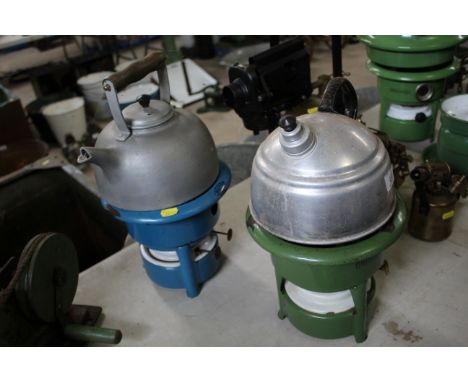 A Haller blue enamel double burner paraffin stove / heater and a Haller green enamel single burner paraffin stove, both with 