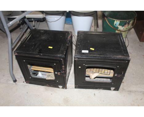 Two vintage twin handled travelling ovens (sold as seen)