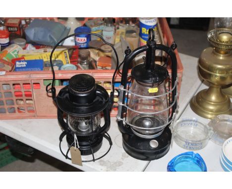 Two Hurricane lamp, a Deitz Vesta New York and a "The Bat" Brand DR Patent Hungary