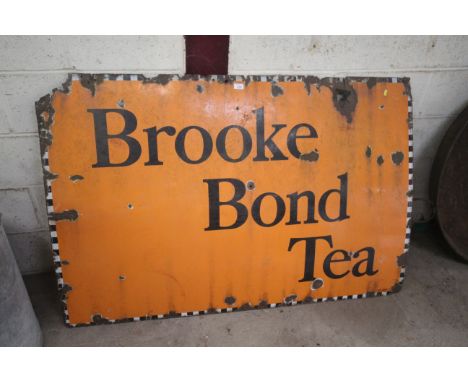 A large enamel sign for Brooke Bond Tea, approx. 60" x 40"