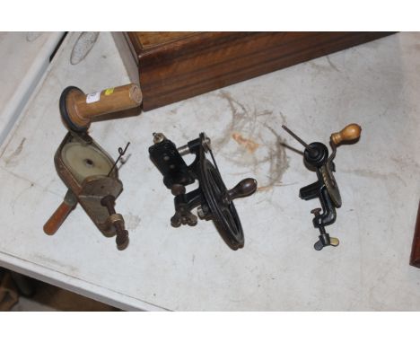Two bobbin winders and a small belt driven pump