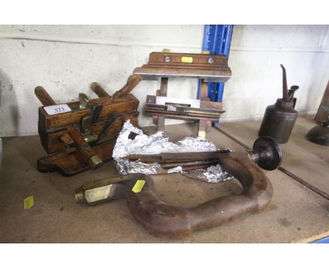 Two moulding planes, a hand brace etc.